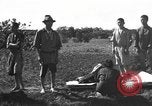 Image of Japanese civilians during invasion of Aguni Jima Okinawa Ryukyu Islands, 1945, second 12 stock footage video 65675042088