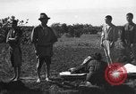 Image of Japanese civilians during invasion of Aguni Jima Okinawa Ryukyu Islands, 1945, second 15 stock footage video 65675042088
