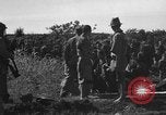 Image of Japanese civilians during invasion of Aguni Jima Okinawa Ryukyu Islands, 1945, second 18 stock footage video 65675042088