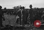 Image of Japanese civilians during invasion of Aguni Jima Okinawa Ryukyu Islands, 1945, second 19 stock footage video 65675042088
