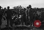 Image of Japanese civilians during invasion of Aguni Jima Okinawa Ryukyu Islands, 1945, second 32 stock footage video 65675042088