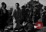 Image of Japanese civilians during invasion of Aguni Jima Okinawa Ryukyu Islands, 1945, second 33 stock footage video 65675042088