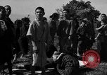 Image of Japanese civilians during invasion of Aguni Jima Okinawa Ryukyu Islands, 1945, second 34 stock footage video 65675042088