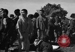 Image of Japanese civilians during invasion of Aguni Jima Okinawa Ryukyu Islands, 1945, second 37 stock footage video 65675042088