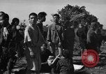 Image of Japanese civilians during invasion of Aguni Jima Okinawa Ryukyu Islands, 1945, second 39 stock footage video 65675042088