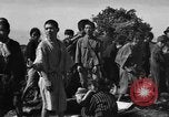 Image of Japanese civilians during invasion of Aguni Jima Okinawa Ryukyu Islands, 1945, second 40 stock footage video 65675042088
