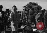 Image of Japanese civilians during invasion of Aguni Jima Okinawa Ryukyu Islands, 1945, second 41 stock footage video 65675042088