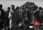 Image of Japanese civilians during invasion of Aguni Jima Okinawa Ryukyu Islands, 1945, second 44 stock footage video 65675042088