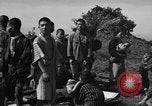 Image of Japanese civilians during invasion of Aguni Jima Okinawa Ryukyu Islands, 1945, second 45 stock footage video 65675042088
