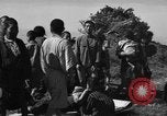 Image of Japanese civilians during invasion of Aguni Jima Okinawa Ryukyu Islands, 1945, second 47 stock footage video 65675042088