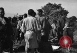 Image of Japanese civilians during invasion of Aguni Jima Okinawa Ryukyu Islands, 1945, second 49 stock footage video 65675042088