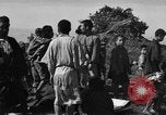 Image of Japanese civilians during invasion of Aguni Jima Okinawa Ryukyu Islands, 1945, second 50 stock footage video 65675042088