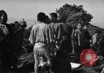 Image of Japanese civilians during invasion of Aguni Jima Okinawa Ryukyu Islands, 1945, second 51 stock footage video 65675042088