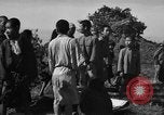 Image of Japanese civilians during invasion of Aguni Jima Okinawa Ryukyu Islands, 1945, second 53 stock footage video 65675042088