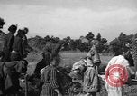 Image of Japanese civilians during invasion of Aguni Jima Okinawa Ryukyu Islands, 1945, second 57 stock footage video 65675042088