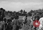 Image of Japanese civilians during invasion of Aguni Jima Okinawa Ryukyu Islands, 1945, second 58 stock footage video 65675042088