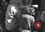 Image of injured Japanese children Okinawa Ryukyu Islands, 1945, second 1 stock footage video 65675042089