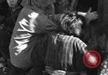 Image of injured Japanese children Okinawa Ryukyu Islands, 1945, second 4 stock footage video 65675042089