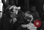 Image of injured Japanese children Okinawa Ryukyu Islands, 1945, second 21 stock footage video 65675042089