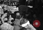 Image of injured Japanese children Okinawa Ryukyu Islands, 1945, second 33 stock footage video 65675042089
