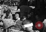 Image of injured Japanese children Okinawa Ryukyu Islands, 1945, second 37 stock footage video 65675042089
