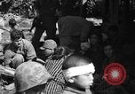 Image of injured Japanese children Okinawa Ryukyu Islands, 1945, second 44 stock footage video 65675042089