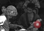 Image of injured Japanese children Okinawa Ryukyu Islands, 1945, second 50 stock footage video 65675042089
