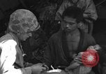 Image of injured Japanese children Okinawa Ryukyu Islands, 1945, second 52 stock footage video 65675042089