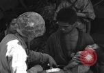 Image of injured Japanese children Okinawa Ryukyu Islands, 1945, second 54 stock footage video 65675042089