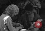 Image of injured Japanese children Okinawa Ryukyu Islands, 1945, second 55 stock footage video 65675042089