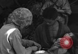 Image of injured Japanese children Okinawa Ryukyu Islands, 1945, second 56 stock footage video 65675042089