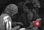 Image of injured Japanese children Okinawa Ryukyu Islands, 1945, second 57 stock footage video 65675042089