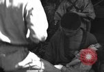 Image of injured Japanese children Okinawa Ryukyu Islands, 1945, second 58 stock footage video 65675042089
