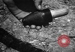 Image of Japanese shell case Okinawa Ryukyu Islands, 1945, second 51 stock footage video 65675042096