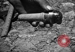 Image of Japanese shell case Okinawa Ryukyu Islands, 1945, second 61 stock footage video 65675042096
