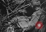 Image of Marine interpreter Okinawa Ryukyu Islands, 1945, second 21 stock footage video 65675042097