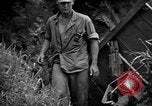 Image of Marine interpreter Okinawa Ryukyu Islands, 1945, second 30 stock footage video 65675042097