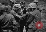 Image of Marine interpreter Okinawa Ryukyu Islands, 1945, second 38 stock footage video 65675042097