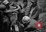 Image of Marine interpreter Okinawa Ryukyu Islands, 1945, second 45 stock footage video 65675042097