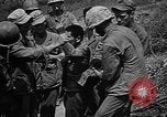 Image of Marine interpreter Okinawa Ryukyu Islands, 1945, second 46 stock footage video 65675042097