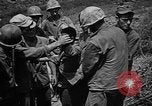 Image of Marine interpreter Okinawa Ryukyu Islands, 1945, second 47 stock footage video 65675042097