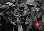Image of Marine interpreter Okinawa Ryukyu Islands, 1945, second 51 stock footage video 65675042097
