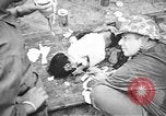 Standbild verletzten Japaner auf Iheya Jima Iheya Jima Japan, 1945, aus Sekunde 32 historischem Filmmaterial Videoclip 65675042118