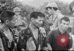 Standbild US Military Police guard Japanisch auf Iheya Jima Iheya Jima Japan, 1945, aus Sekunde 20 historischem Filmmaterial Videoclip 65675042119