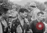 Standbild US Military Police guard Japanisch auf Iheya Jima Iheya Jima Japan, 1945, aus Sekunde 21 historischem Filmmaterial Videoclip 65675042119