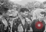 Standbild US Military Police guard Japanisch auf Iheya Jima Iheya Jima Japan, 1945, aus Sekunde 22 historischem Filmmaterial Videoclip 65675042119