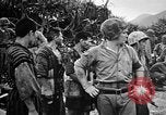 Standbild US Military Police guard Japanisch auf Iheya Jima Iheya Jima Japan, 1945, aus Sekunde 32 historischem Filmmaterial Videoclip 65675042119