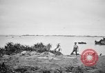 Standbild US Military Police guard Japanisch auf Iheya Jima Iheya Jima Japan, 1945, aus Sekunde 46 historischem Filmmaterial Videoclip 65675042119