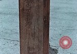 Image of wooden post Hiroshima Japan, 1946, second 17 stock footage video 65675042128