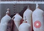 Standbild Storage tank Hiroshima Japan, 1946, aus Sekunde 11 historischem Filmmaterial Videoclip 65675042131